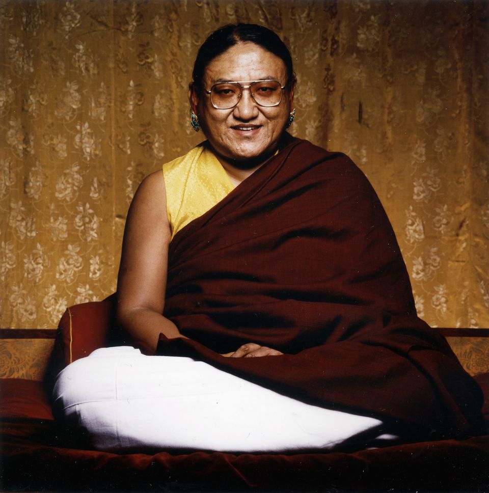 Young Sakya Trizin Ngawang Kunga in traditional monastic attire during his early years, displaying the gentle bearing and spiritual gravitas that marked his recognition as throne holder
